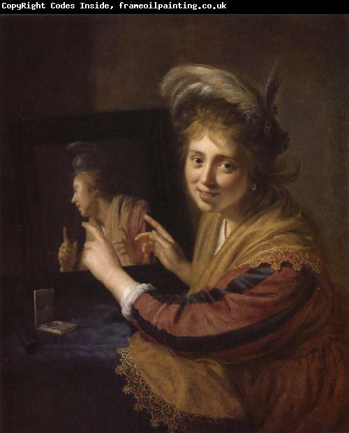 REMBRANDT Harmenszoon van Rijn Girl at a Mirror